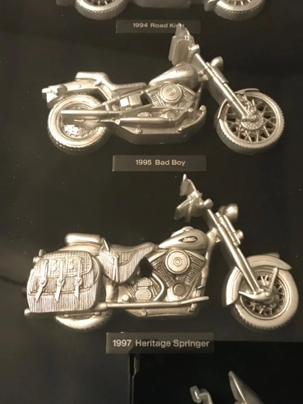 Framed Harley Davidson memorabilia